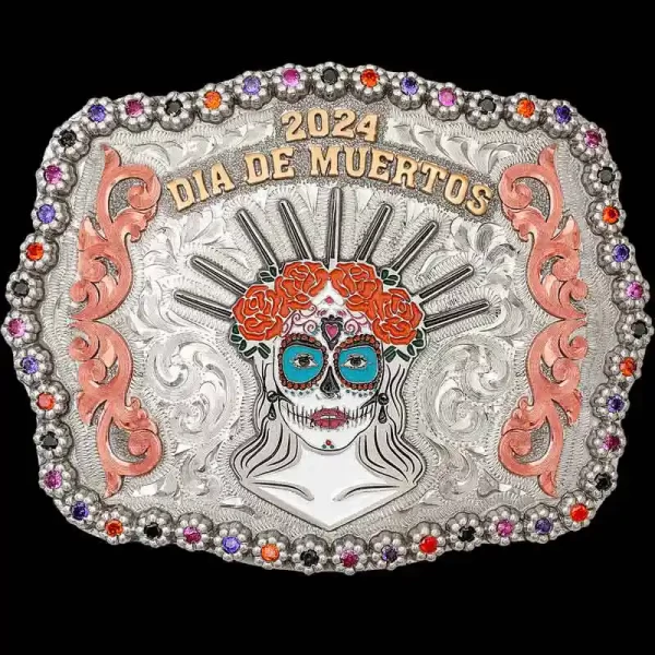 Celebrate the Day of the Dead with our colorful Pasadena Belt Buckle! It is crafted on a hand-engraved, German Silver base. Detailed with Copper scrolls, Jeweler's Bronze lettering and a berry edge.

Customize it with your lettering, figure, and stones 